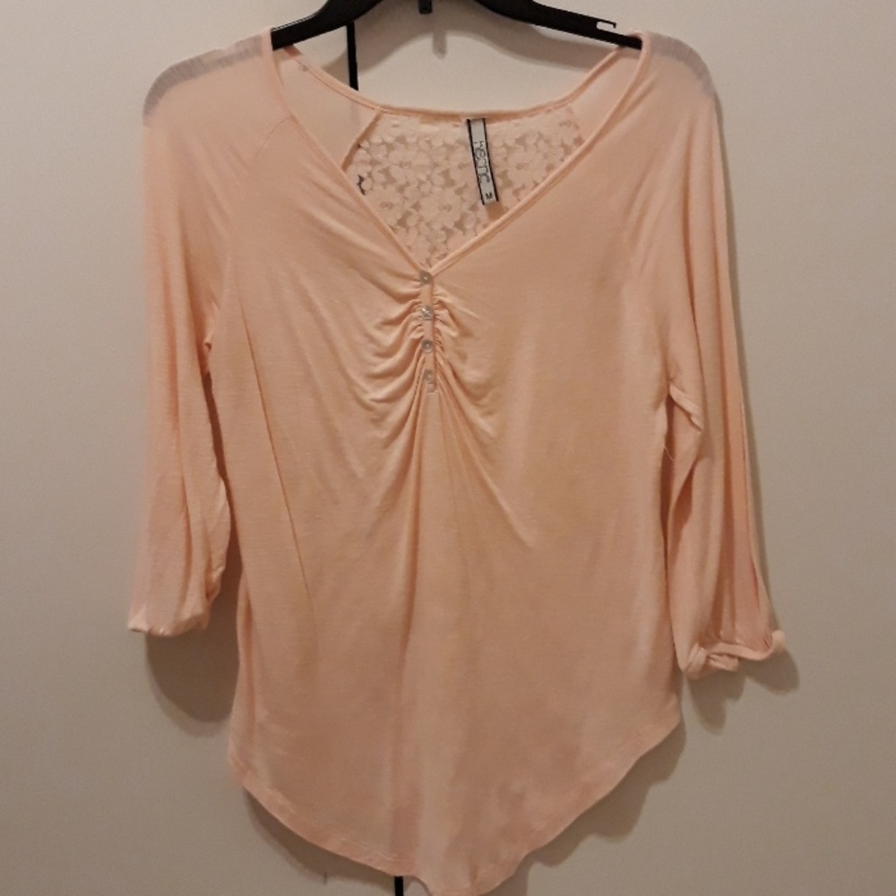 It's a cute shirt by the brand "Kische"never wore